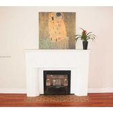 a picture of a living room with a fireplace