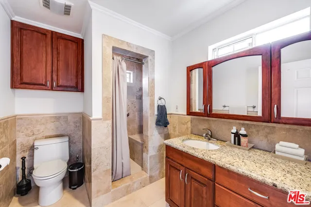 a view of a kitchen from the hallway