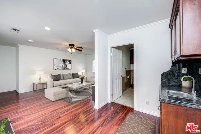 a view of backyard with a small cabin