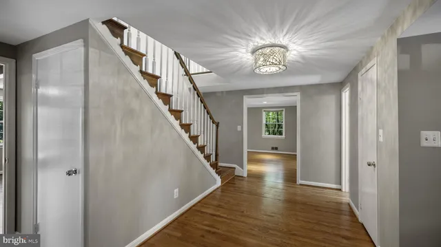 a view of entryway with wooden floor