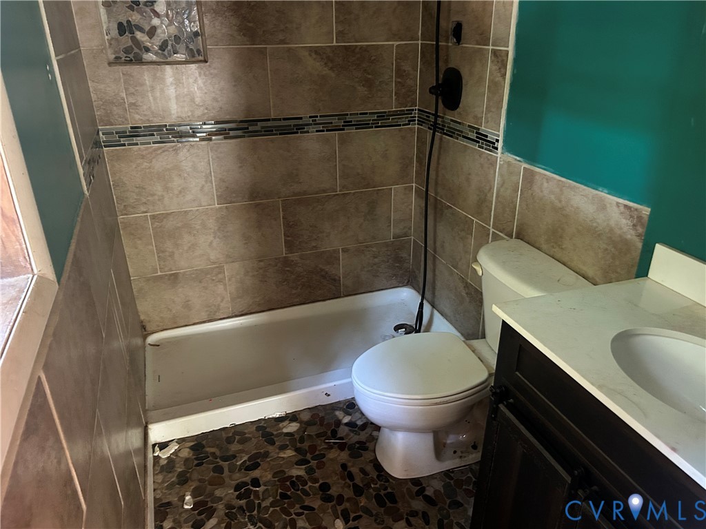 2239 Owl Creek Road Keysville, VA 23947 - Photo 15 of 30 a bathroom with a toilet and a shower