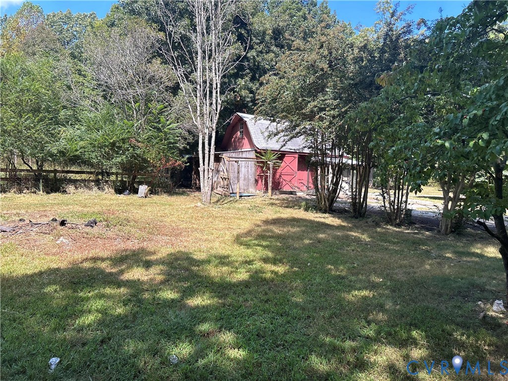 2239 Owl Creek Road Keysville, VA 23947 - Photo 25 of 30 a view of large tree with house in background