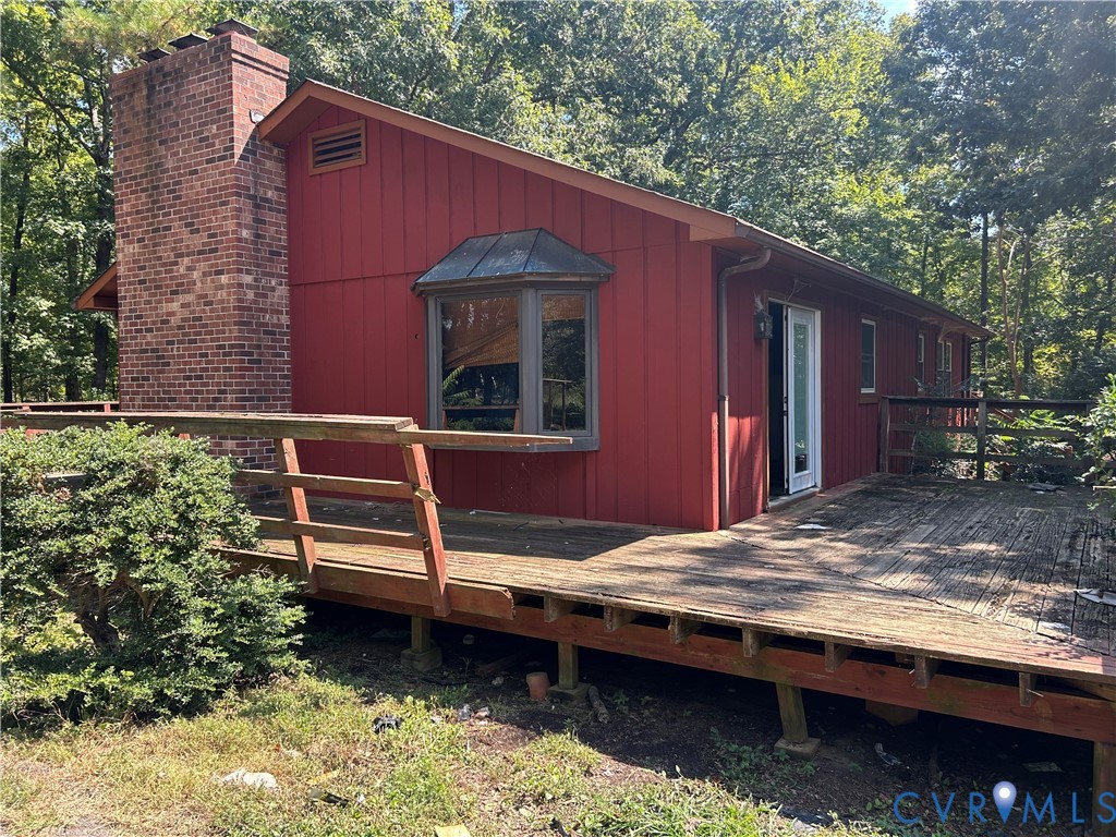 2239 Owl Creek Road Keysville, VA 23947 - Photo 4 of 30 a view of house with backyard and seating area