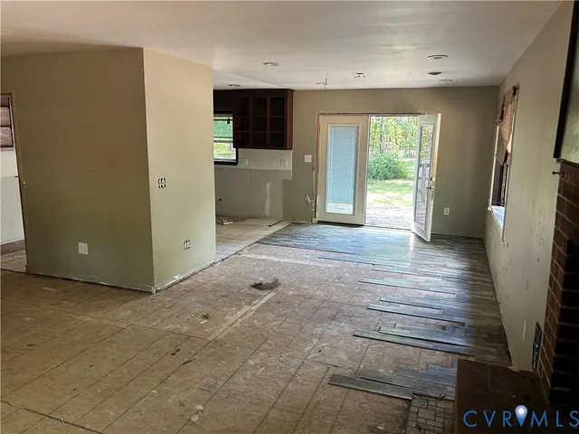 a view of livingroom with hardwood floor and a window
