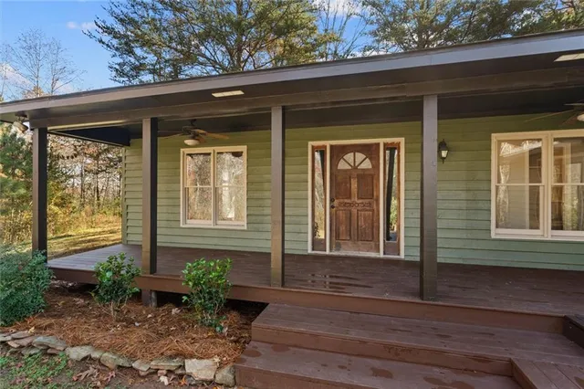 a front view of a house with porch