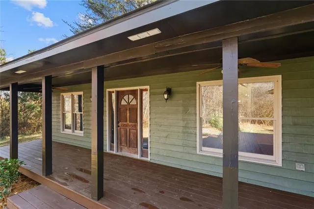 a front view of a house with a glass door