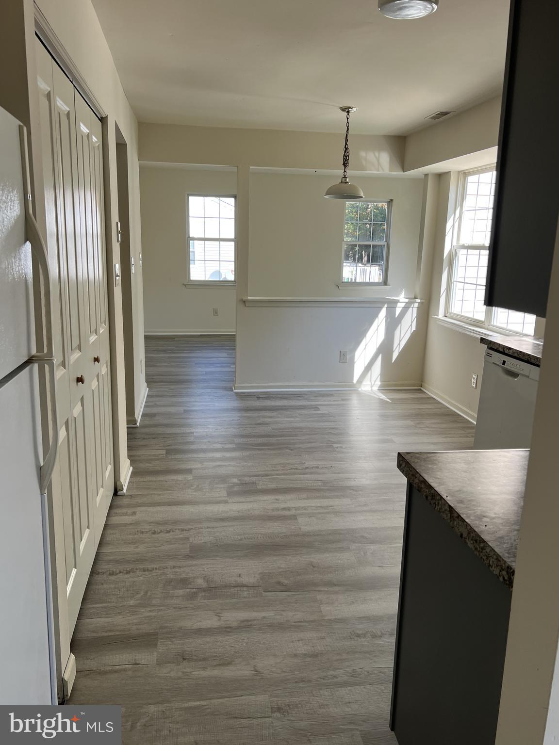 560 South Pitney Road Absecon, NJ 08205 - Photo 11 of 32 From dining room doorway into kitchen and nook