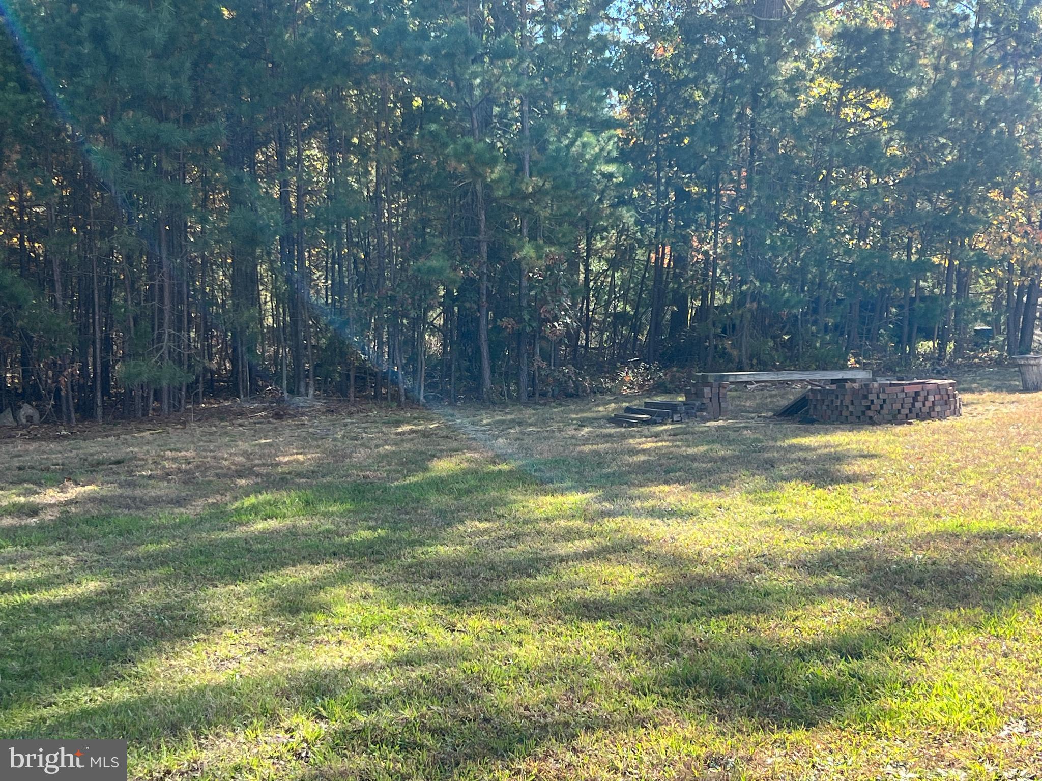 560 South Pitney Road Absecon, NJ 08205 - Photo 32 of 32 Back yard with fire pit