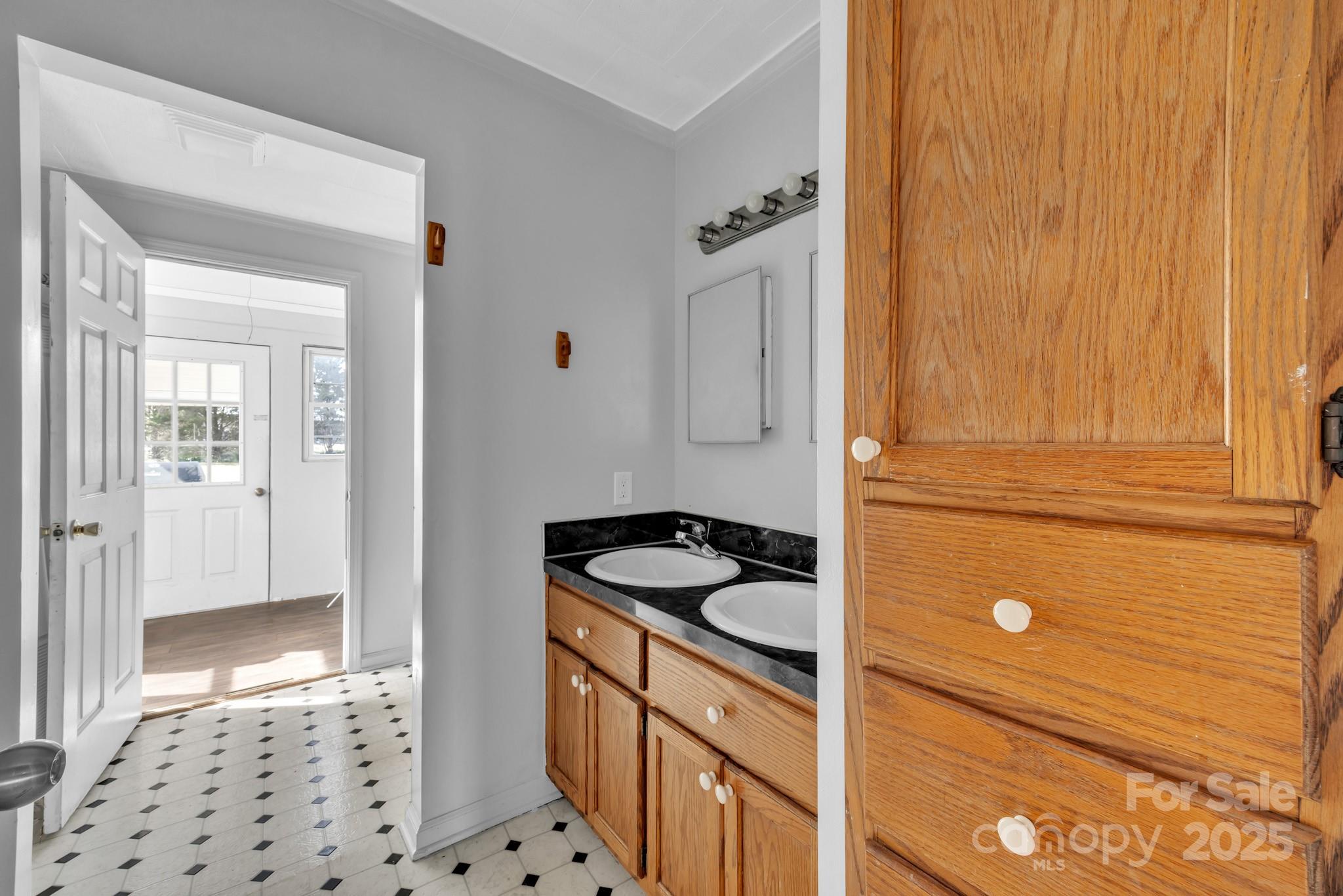 34 Lee Road Stony Point, NC 28678 - Photo 11 of 22 a kitchen with granite countertop a sink and a refrigerator