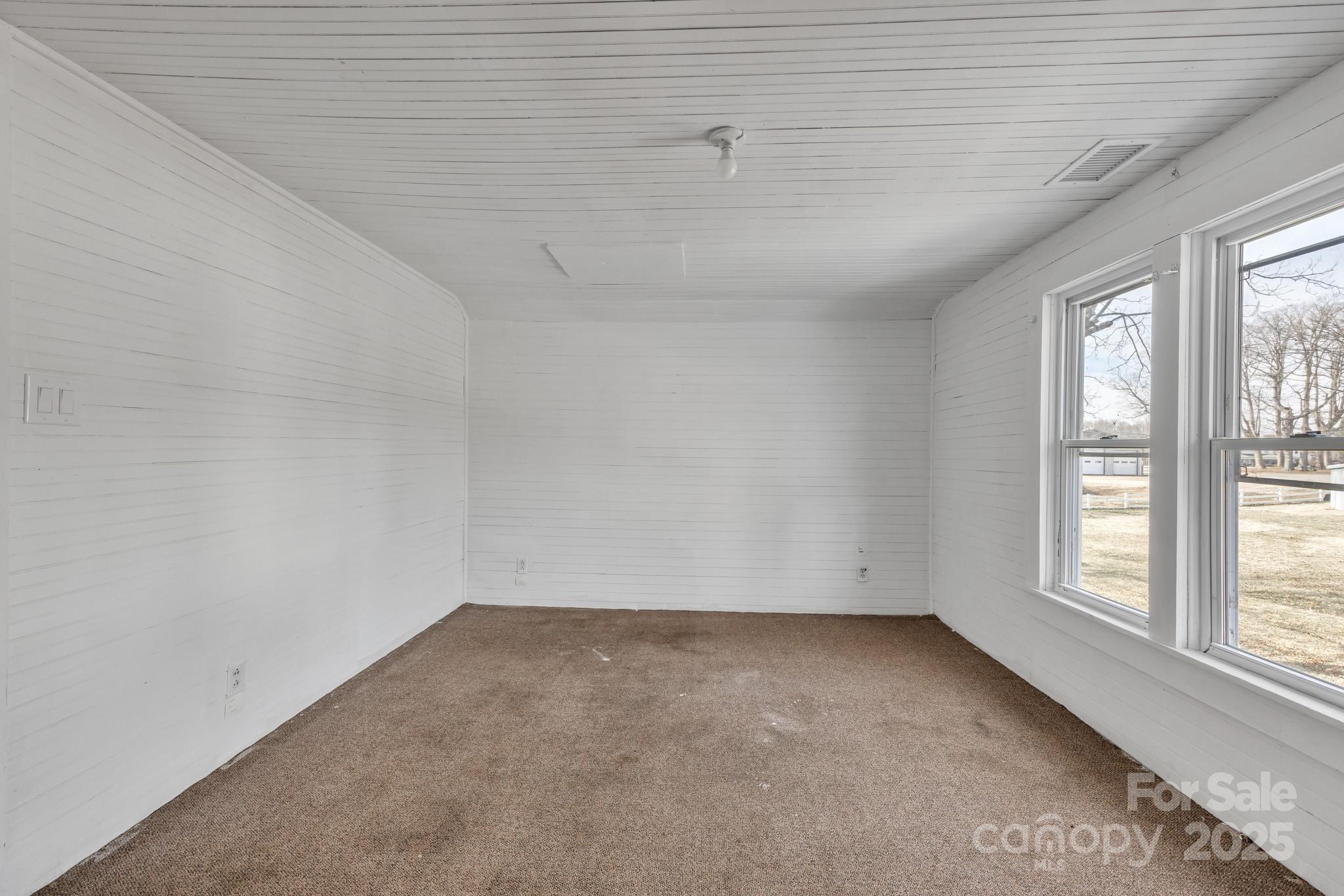 34 Lee Road Stony Point, NC 28678 - Photo 12 of 22 an empty room with windows