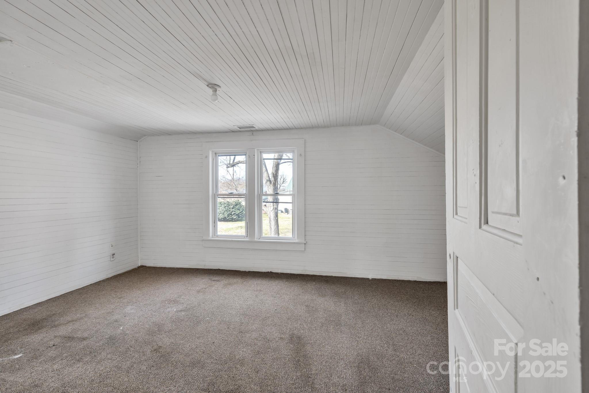34 Lee Road Stony Point, NC 28678 - Photo 13 of 22 an empty room with a window
