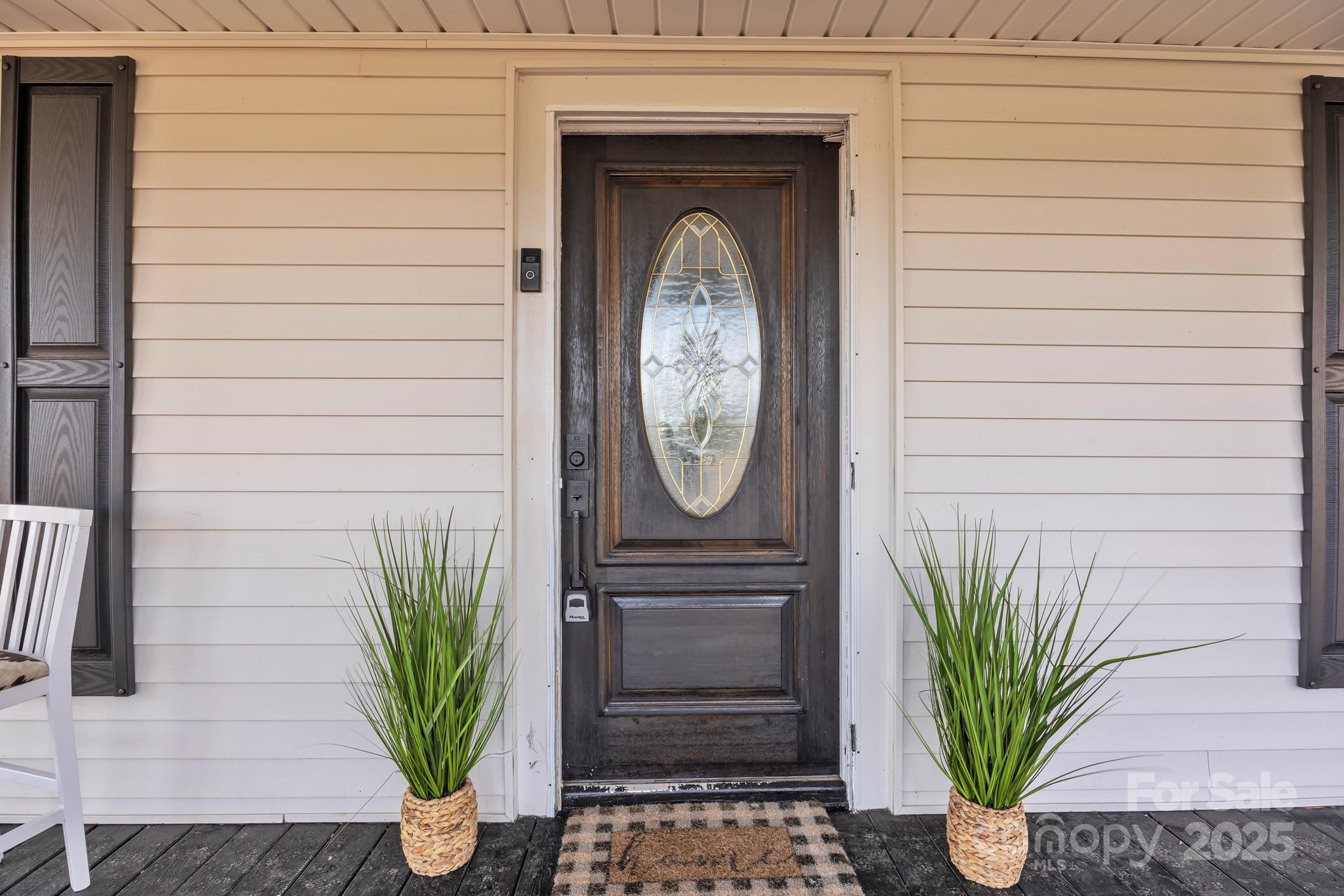34 Lee Road Stony Point, NC 28678 - Photo 17 of 22 a front view of a house with garden