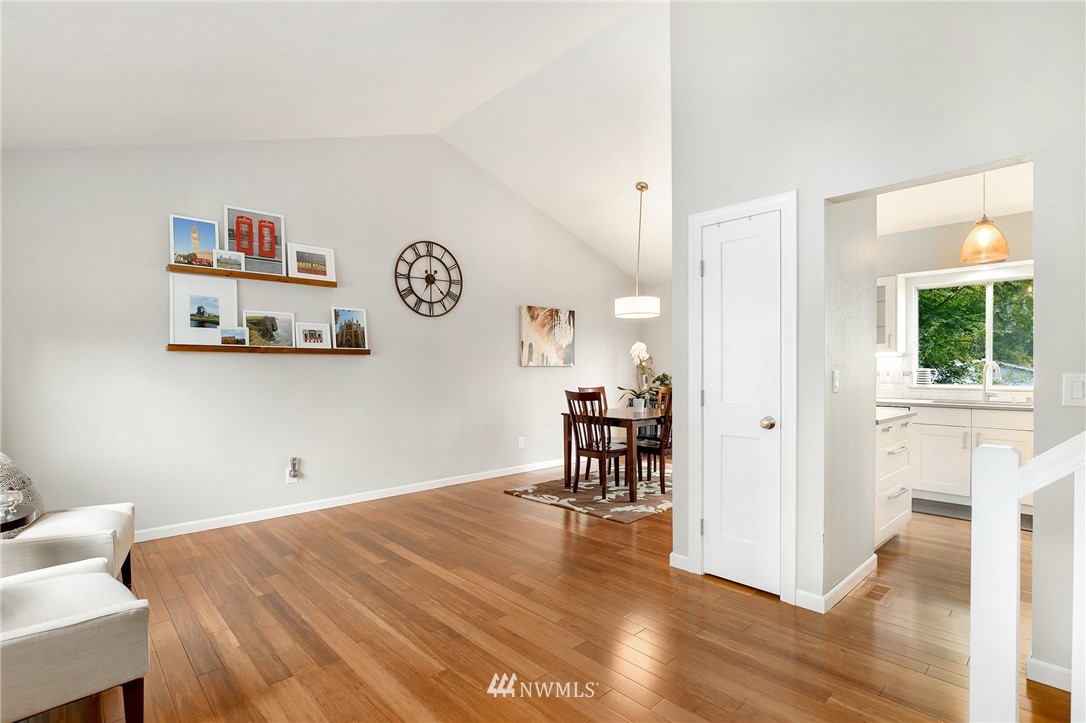 3602 Northeast 11th Court Renton, WA 98056 - Photo 8 of 25 a view of a room with wooden floor and furniture