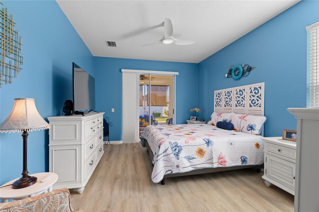 15657 Southwest 11th Terrace Road Ocala, FL 34473 - Photo 15 of 42 a bedroom with a bed and a dresser