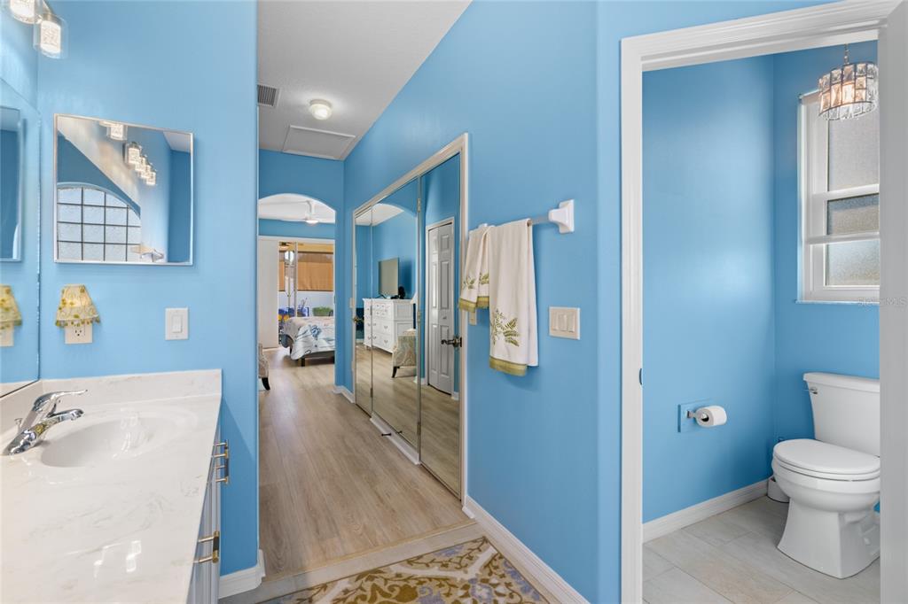 15657 Southwest 11th Terrace Road Ocala, FL 34473 - Photo 20 of 42 a bathroom with a sink a toilet and shower