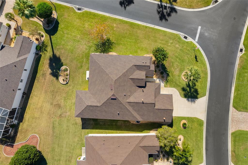 15657 Southwest 11th Terrace Road Ocala, FL 34473 - Photo 33 of 42 an aerial view of a house with swimming pool