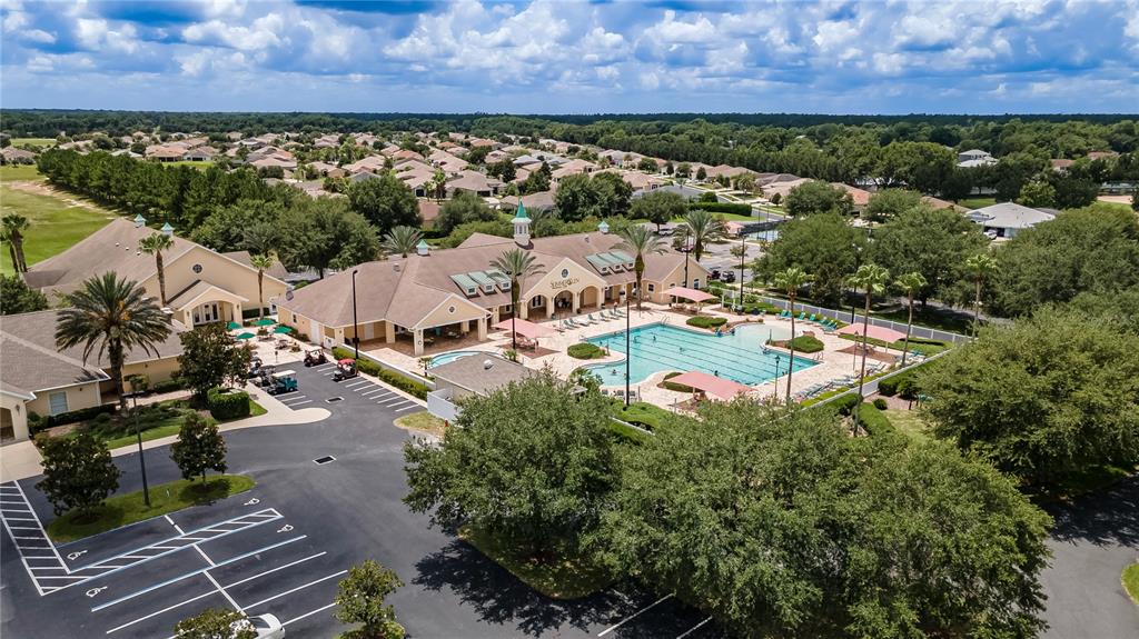 15657 Southwest 11th Terrace Road Ocala, FL 34473 - Photo 41 of 42 an aerial view of residential houses with outdoor space and street view