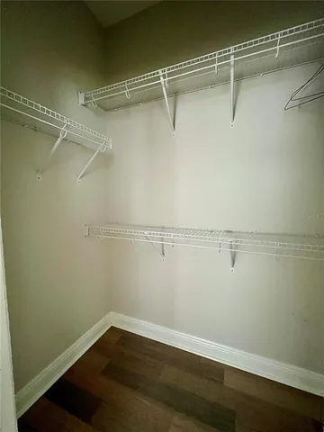 a view of a room with racks on the wall