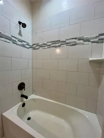 a bathroom with a bathtub