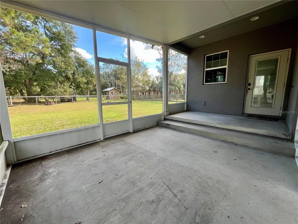6328 Barton Road Plant City, FL 33565 - Photo 28 of 28 a view of an empty room with large windows
