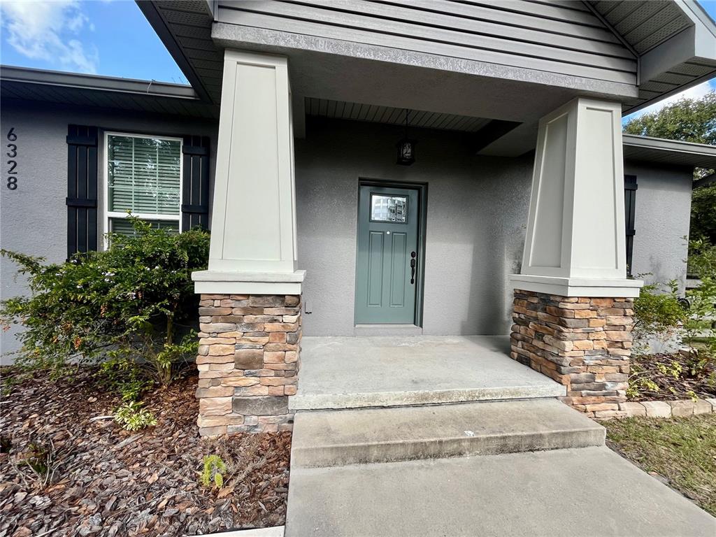 6328 Barton Road Plant City, FL 33565 - Photo 8 of 28 a view of entrance of the house