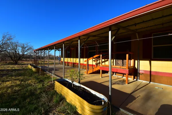 a kitchen with stainless steel appliances a refrigerator a stove a microwave and cabinets