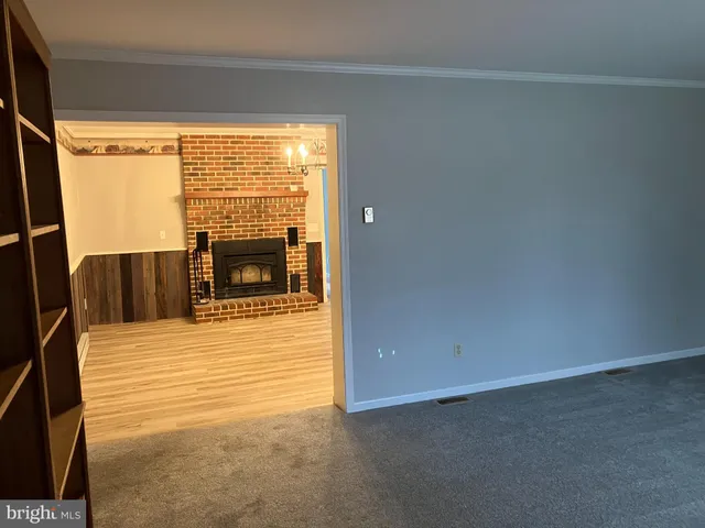 a view of a living room with a large window