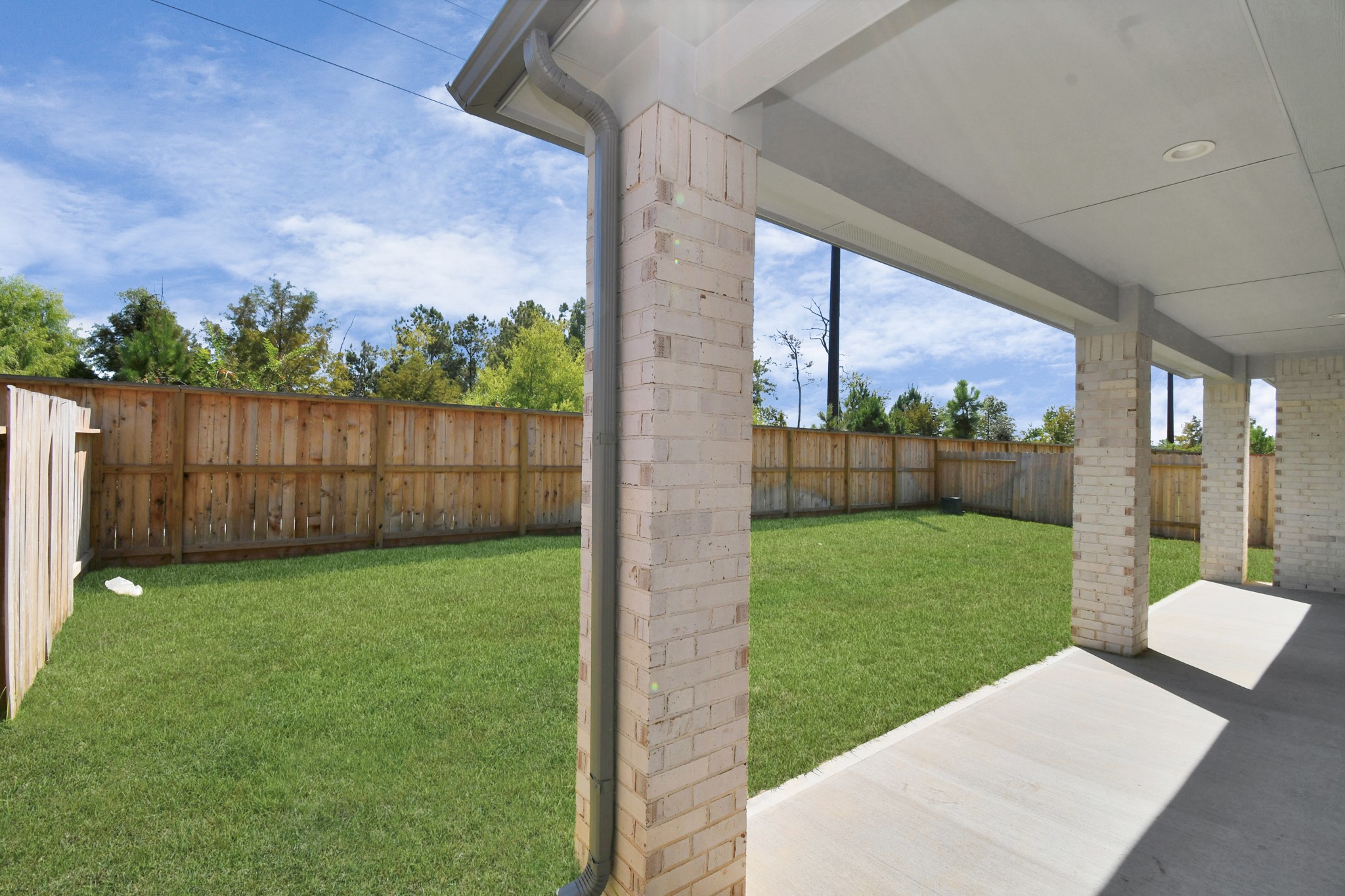 3038 Native Spg Drive Spring, TX 77373 - Photo 40 of 40 Experience outdoor living at its finest on this expansive covered patio, thoughtfully designed for BBQs and delightful outdoor dining. Sample photo of completed home with similar floor plan. Actual colors and selections may vary.