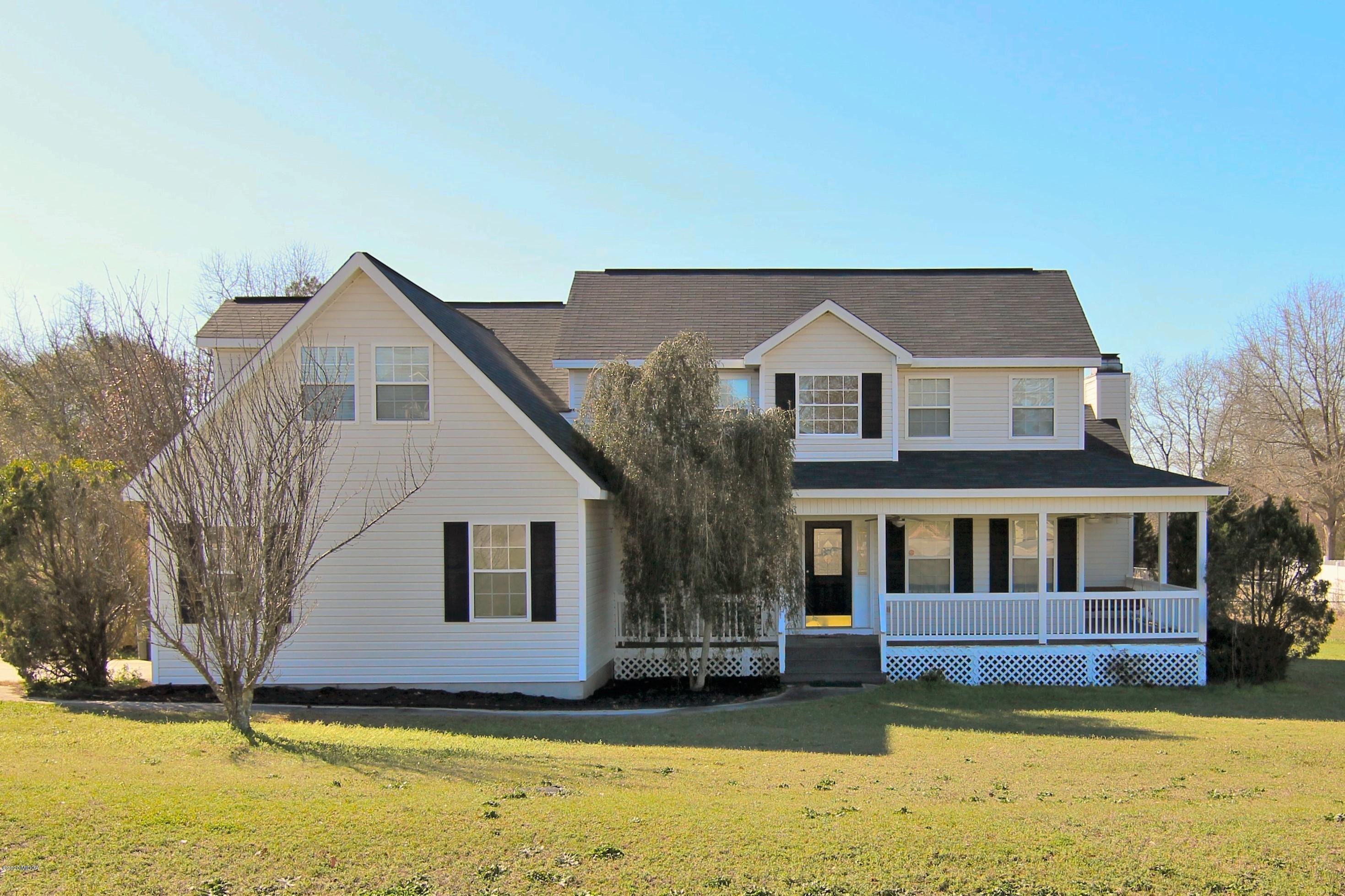 226 Ruben Road Byron, GA 31008 - Photo 1 of 30 a front view of a house with a yard