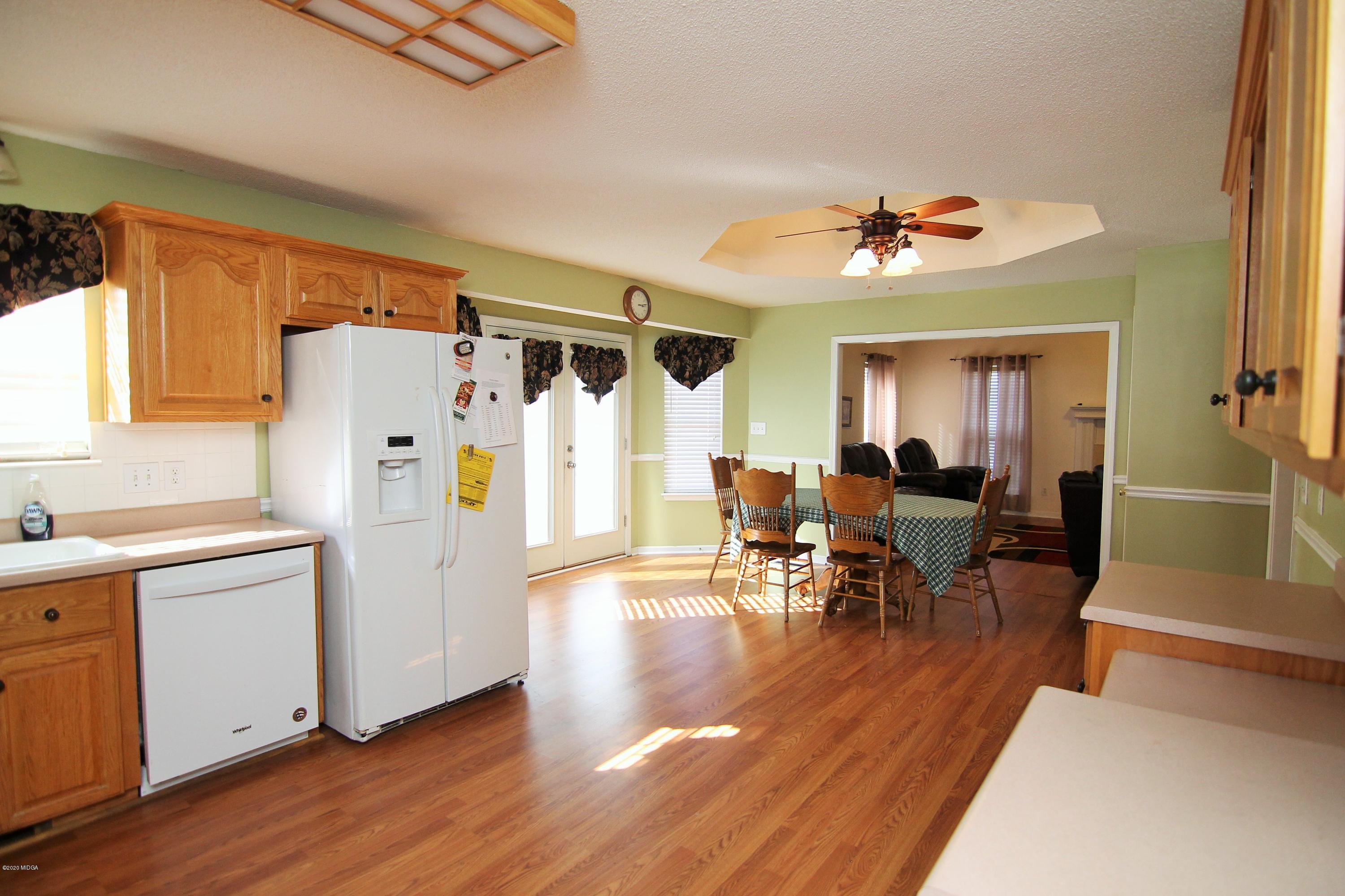 226 Ruben Road Byron, GA 31008 - Photo 14 of 30 a living room with furniture and a wooden floor