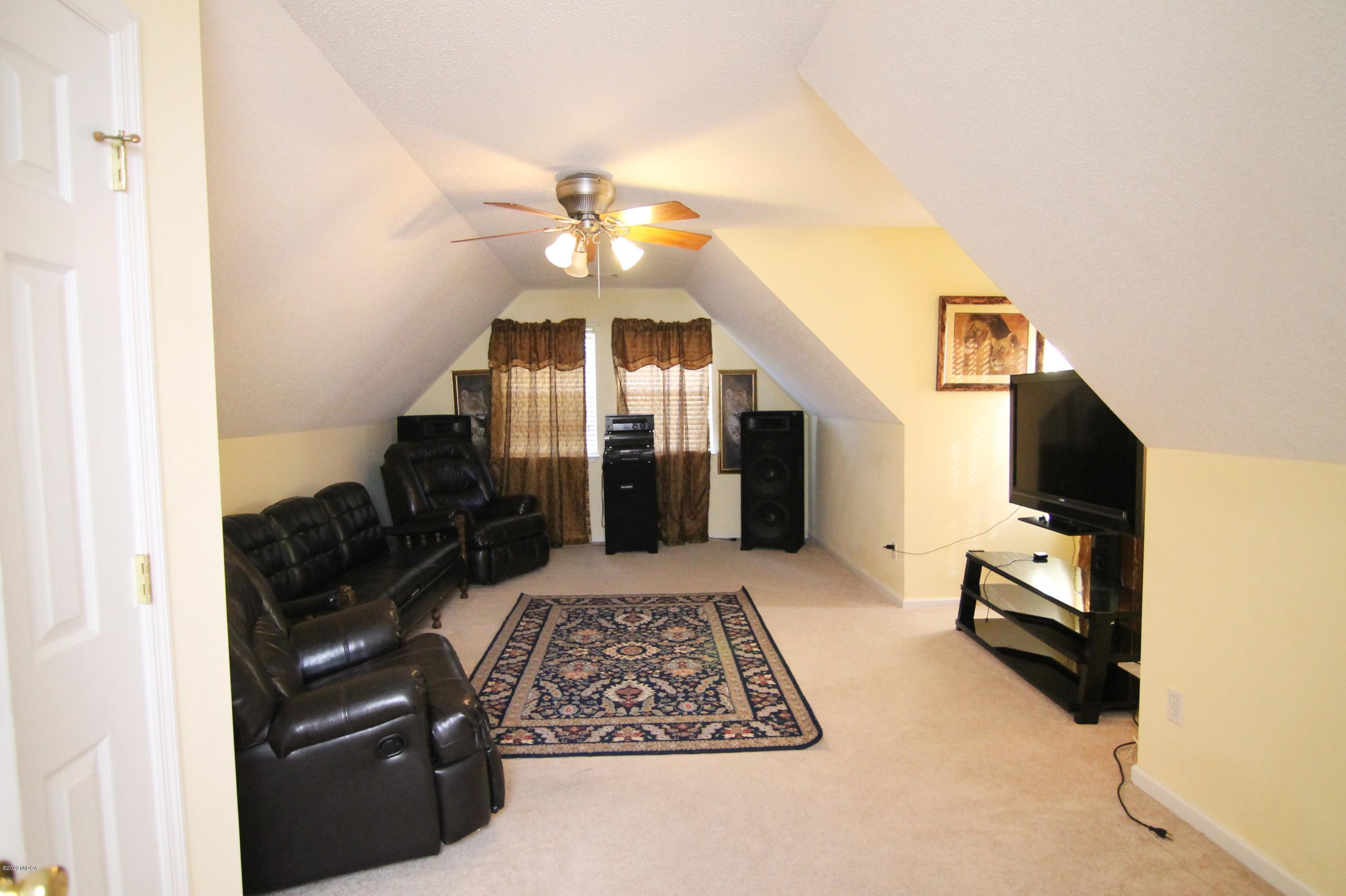 226 Ruben Road Byron, GA 31008 - Photo 24 of 30 a living room with furniture and a flat screen tv
