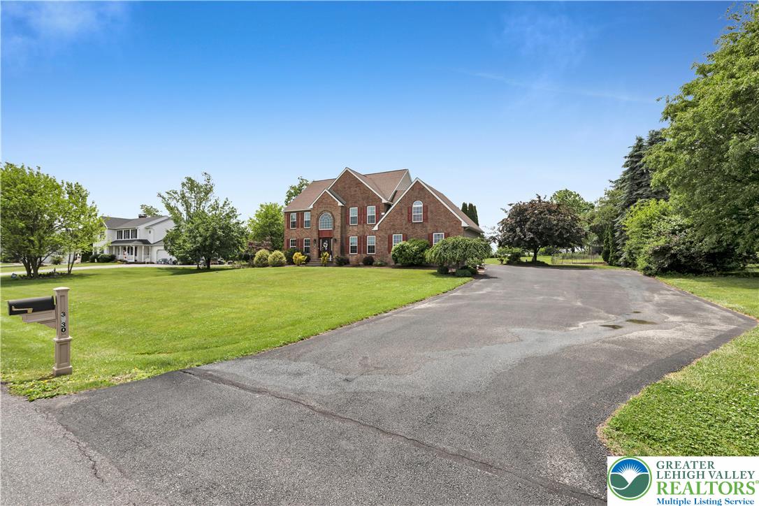 3830 McIntosh Drive Orefield, PA 18069 - Photo 3 of 36 a view of a house with a yard