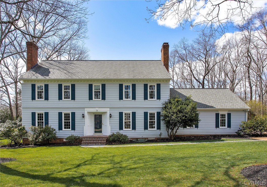 2800 Queenswood Road Midlothian, VA 23113 - Photo 1 of 45 a front view of a house with a garden and trees