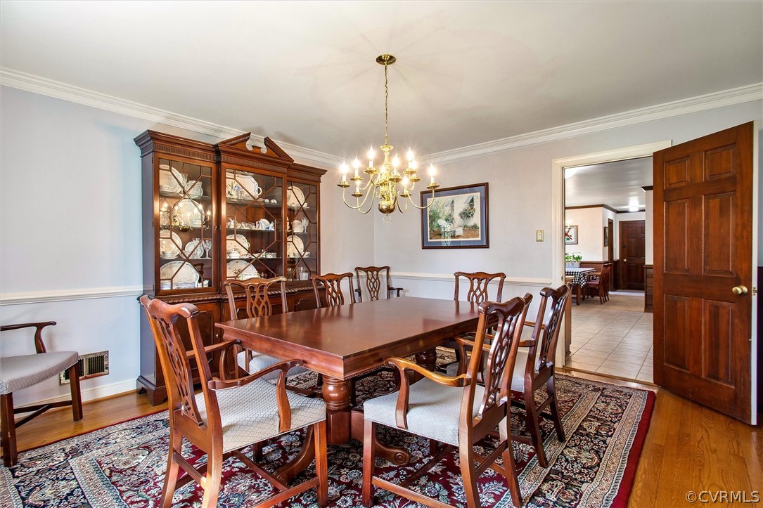 2800 Queenswood Road Midlothian, VA 23113 - Photo 18 of 45 a view of a dining room with furniture and window