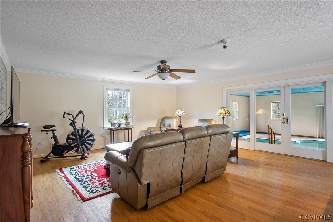 2800 Queenswood Road Midlothian, VA 23113 - Photo 21 of 45 a living room with furniture and a wooden floor