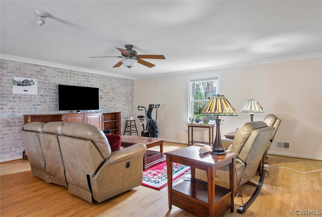 2800 Queenswood Road Midlothian, VA 23113 - Photo 22 of 45 a living room with furniture and a flat screen tv