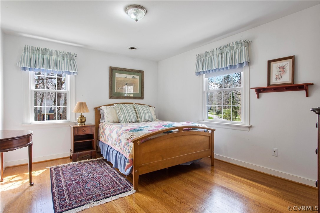 2800 Queenswood Road Midlothian, VA 23113 - Photo 31 of 45 a bedroom with a bed wooden floor and window