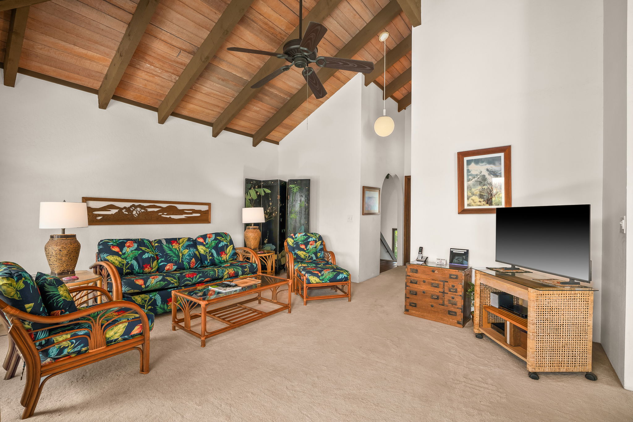 1901 Poipu Road, Unit 832 Koloa, HI 96756 - Photo 4 of 19 a living room with furniture and a flat screen tv