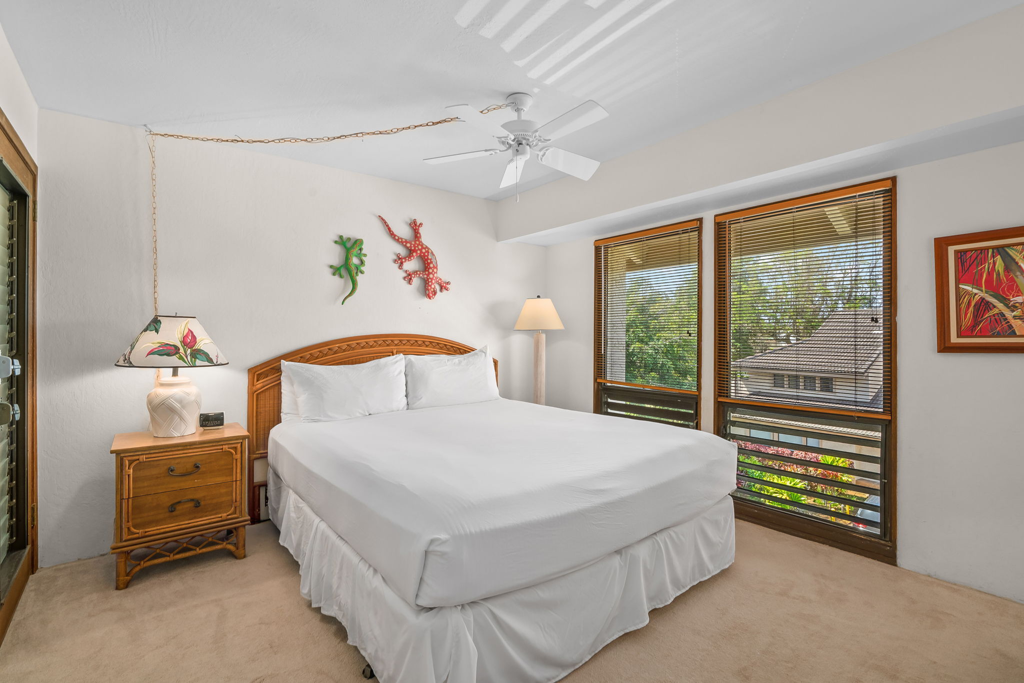 1901 Poipu Road, Unit 832 Koloa, HI 96756 - Photo 6 of 19 a bedroom with a bed and a window