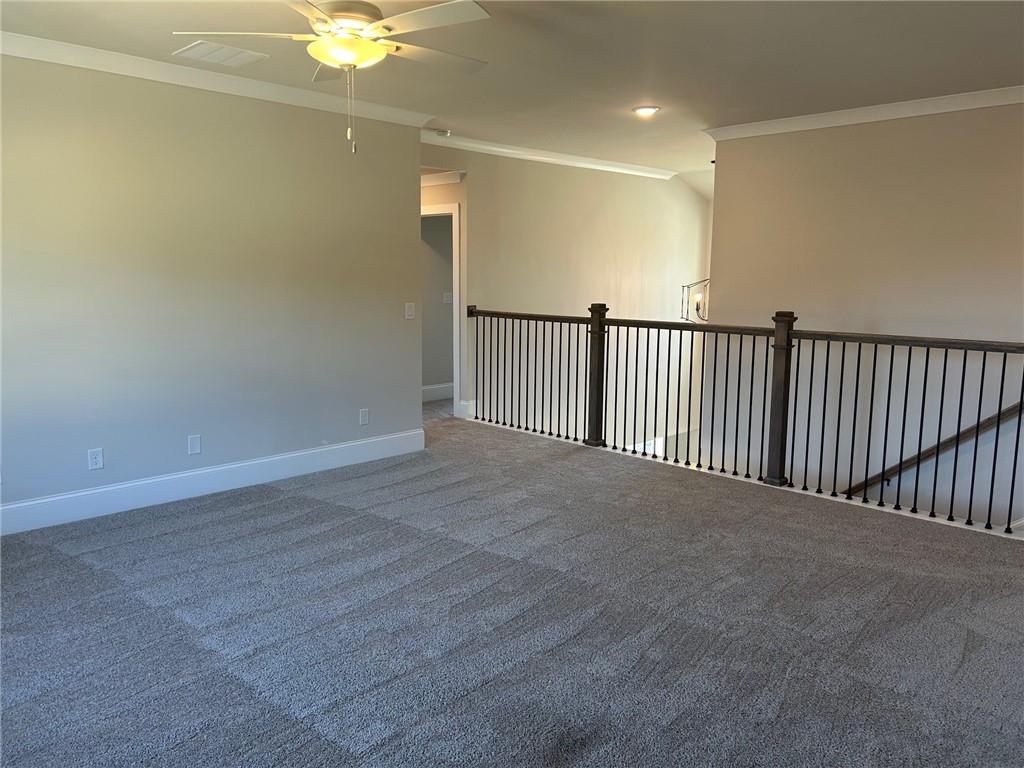 4265 Trinity Oaks Trail Cumming, GA 30040 - Photo 12 of 25 a view of a hallway