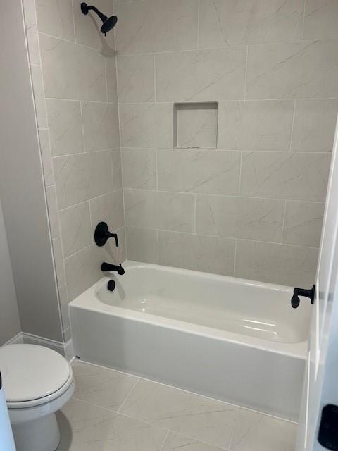 4265 Trinity Oaks Trail Cumming, GA 30040 - Photo 19 of 25 a bathroom with a toilet and a bathtub