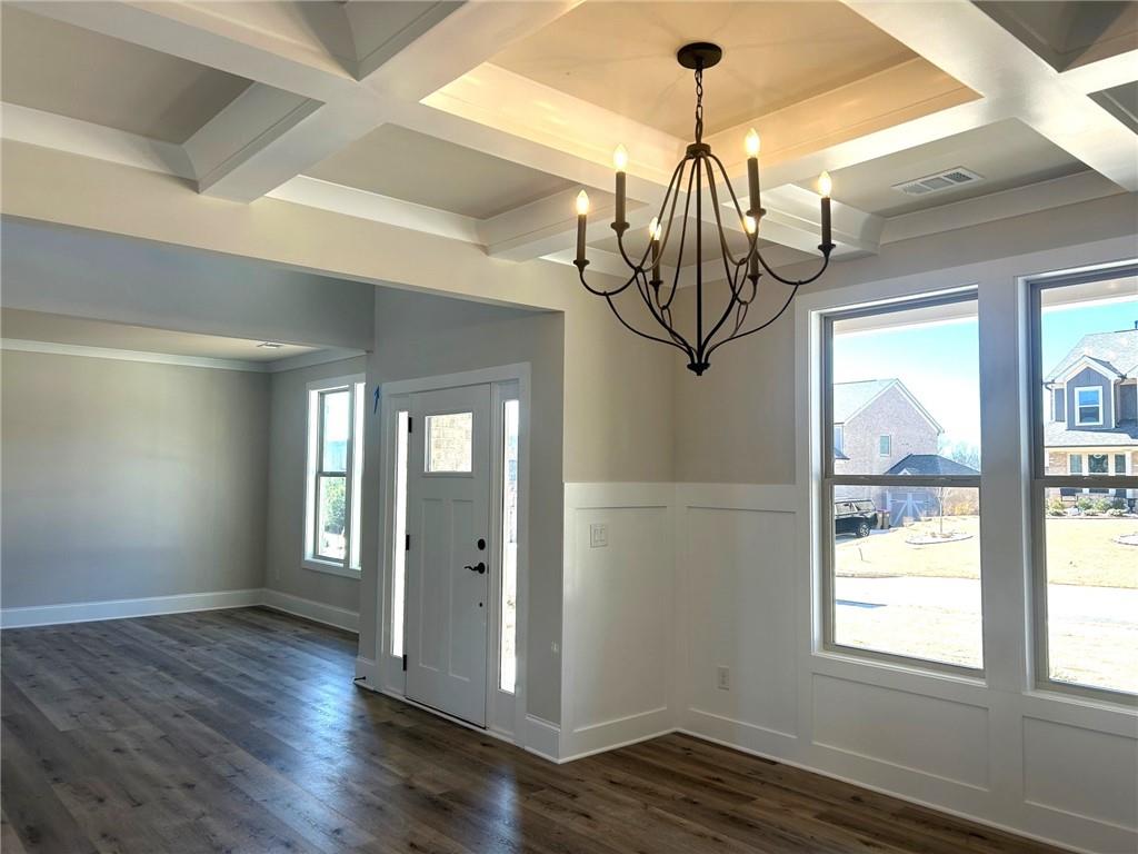 4265 Trinity Oaks Trail Cumming, GA 30040 - Photo 6 of 25 a view of entryway with wooden floor