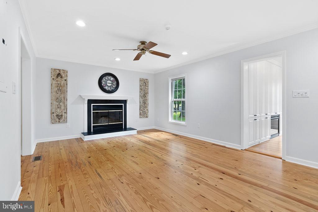 19821 Foggy Bottom Road Bluemont, VA 20135 - Photo 51 of 92 a view of an empty room with wooden floor and a window