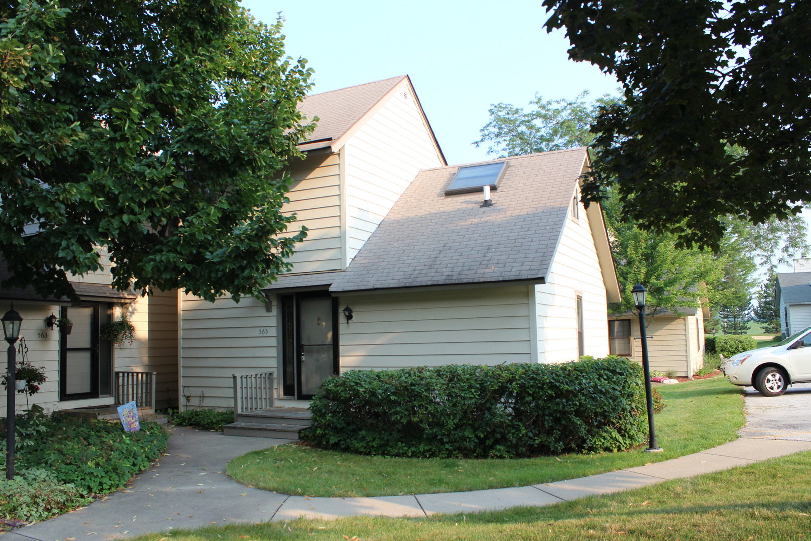 565 Dunham Road Gurnee, IL 60031 - Photo 1 of 17 a view of a house with a yard