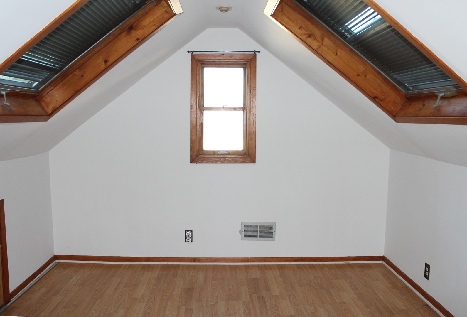 565 Dunham Road Gurnee, IL 60031 - Photo 8 of 17 a view of room with window and wooden floor