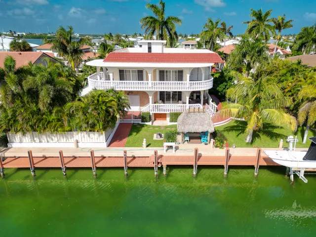 a view of a house with a garden