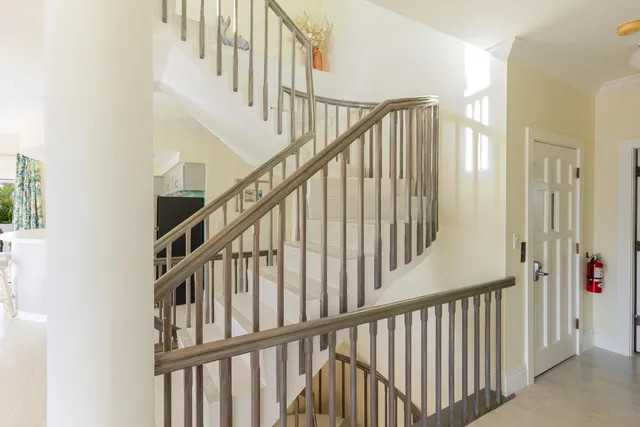 a view of a workspace with furniture and a workspace