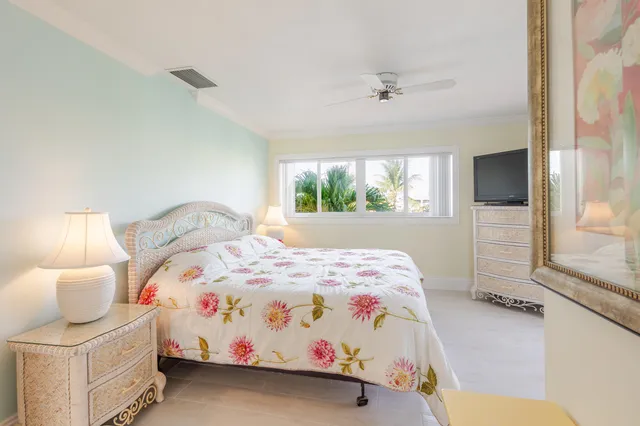 a bathroom with a shower sink and mirror