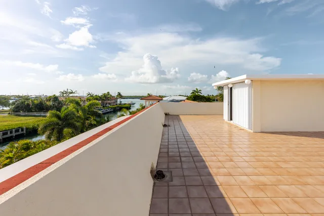 a utility room with multiple dryer and washer