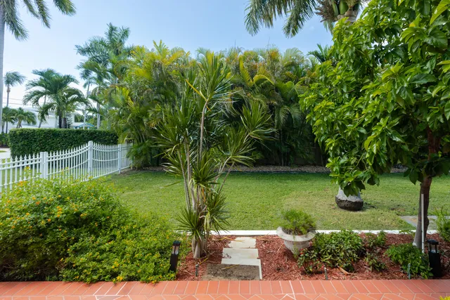 a view of hall way with furniture